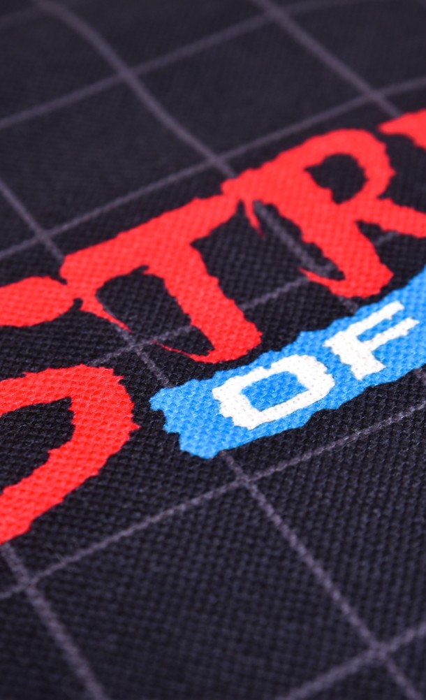 Close up detail on the print of the Streets of Rage cushion cover from our SEGA collection