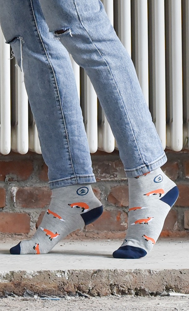 Model wearing Pet The Fox Socks from our Ghost of Tsushima collection