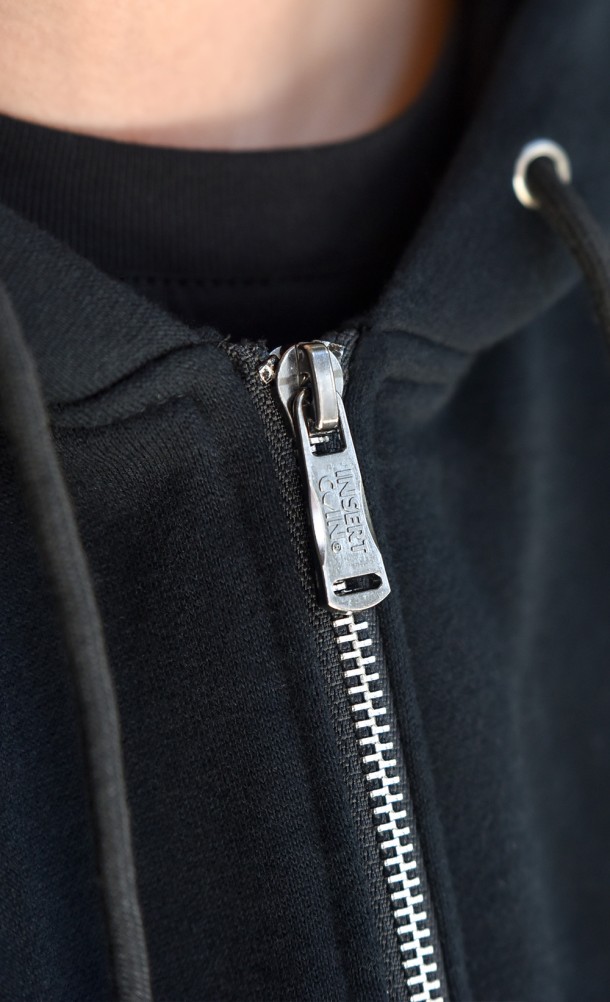 Close up detail on the zip of the Shepard N7 Hoodie from our Mass Effect collection