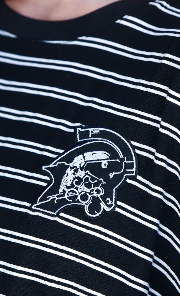 Close up detail on front print of the KP Stripe T-Shirt from our Kojima Productions collection