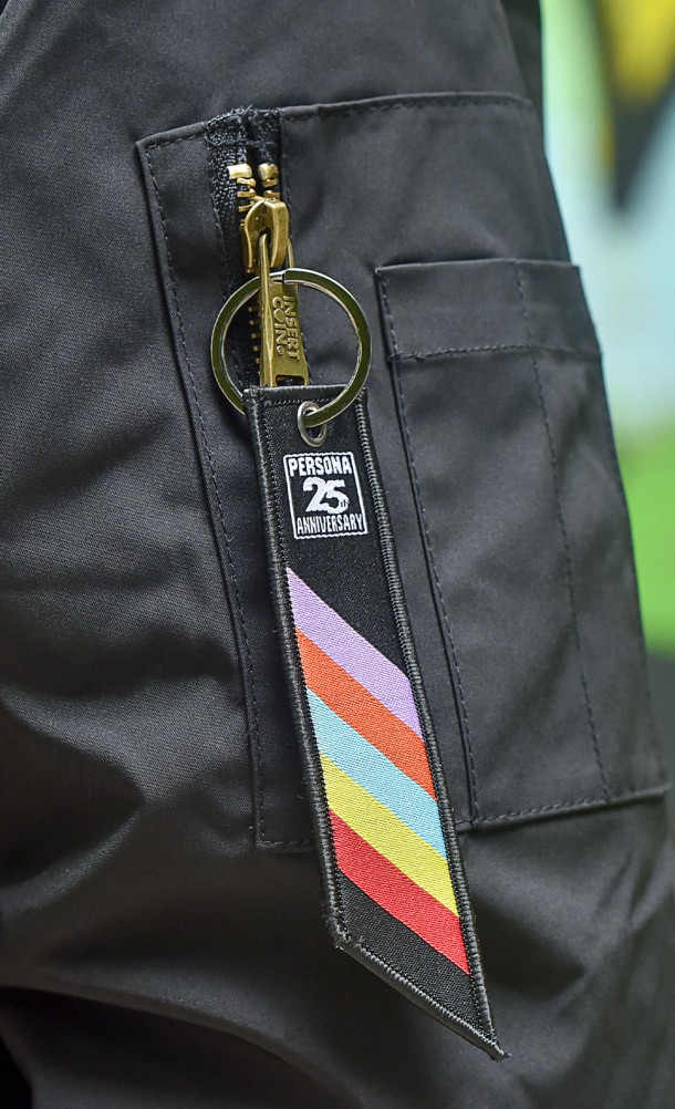 Close up detail on the arm zip pull of the Persona 25th Anniversary Bomber jacket from our Persona 25th Anniversary collection