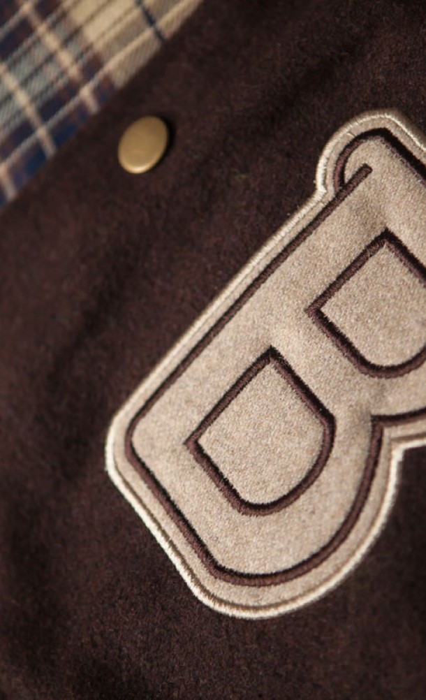 Close up detail on the front of the Hotline Miami varsity jacket from our Hotline Miami collection
