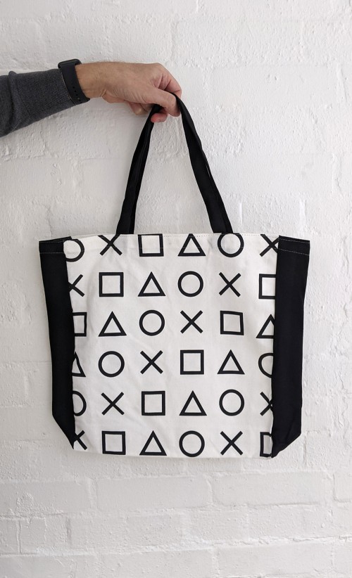 Image of the front of the DualSense Tote bag from our PlayStation collection