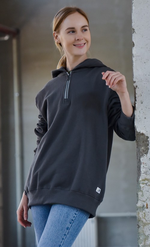 Model wearing the Ethan half-zip hoodie from our Resident Evil Village collection