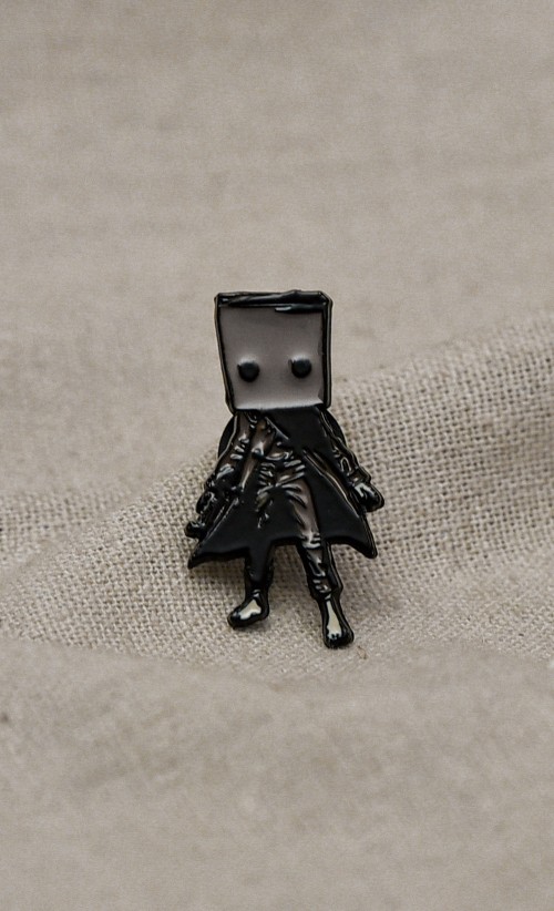 Image of the Mono Enamel pin from our Little Nightmares collection
