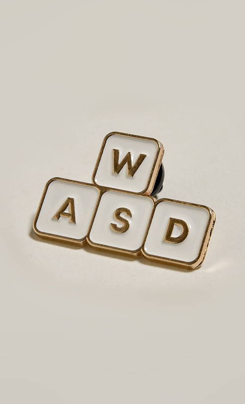 Image of the WASD Enamel pin from our WASD collection