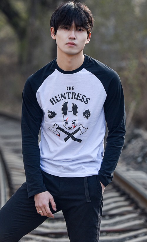 Model wearing The Huntress Raglan T-shirt from our Dead by Daylight collection