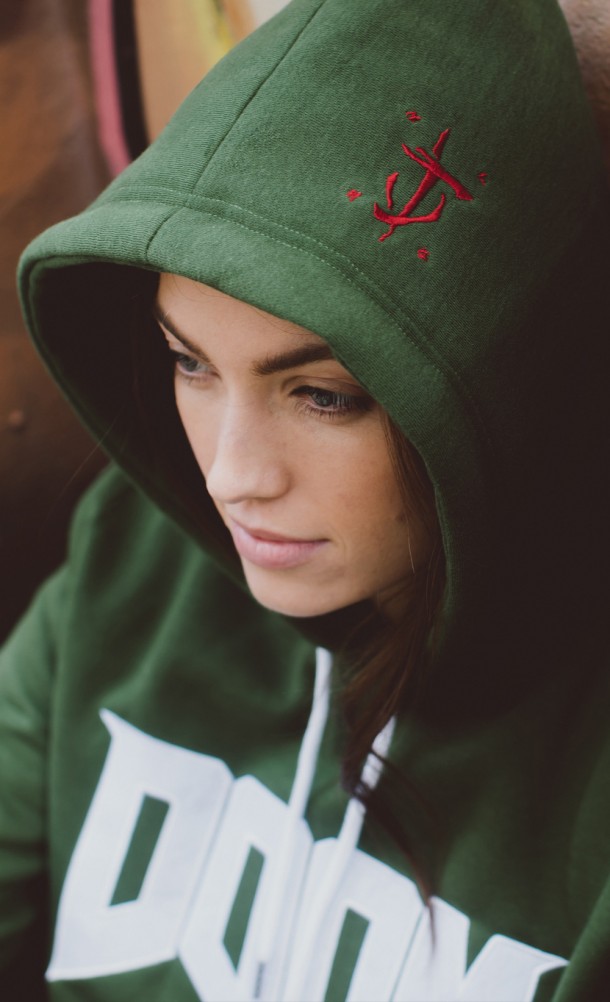 Model wearing the DOOMGUY hoodie from our DOOM collection