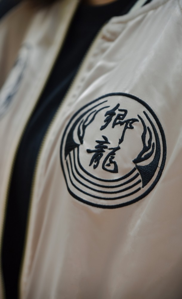 Close up detail on the chest print of the Goda Souvenir jacket from our Yakuza collection