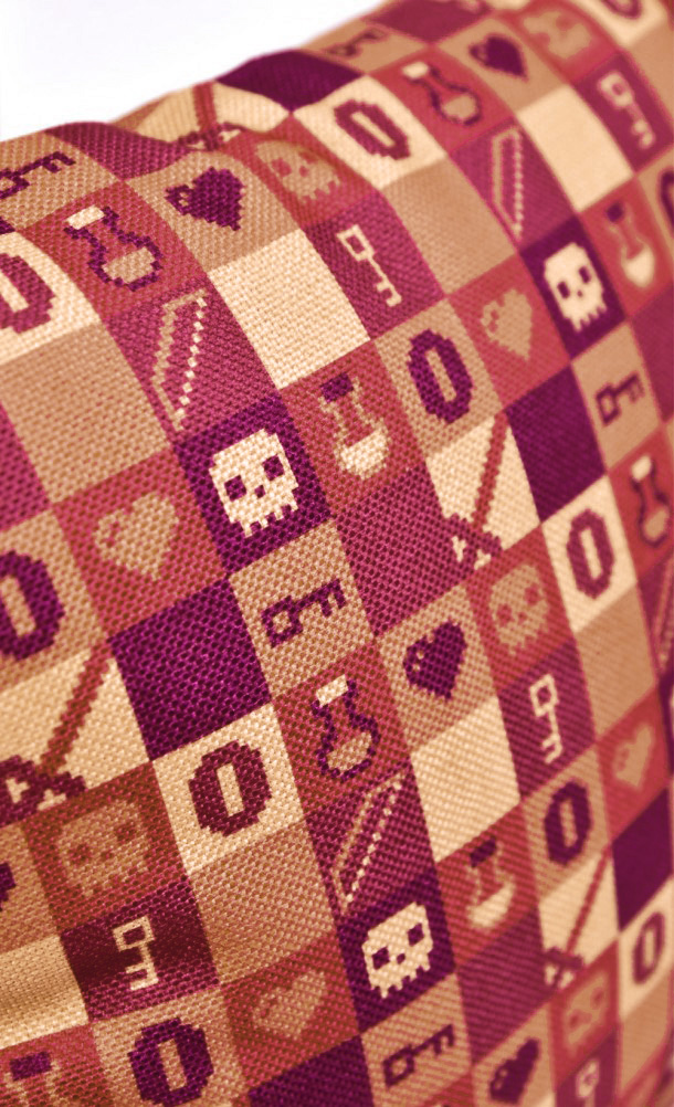 Close up detail on the front print of the Dungeon Crawler's cushion cover from our Insert Coin collection