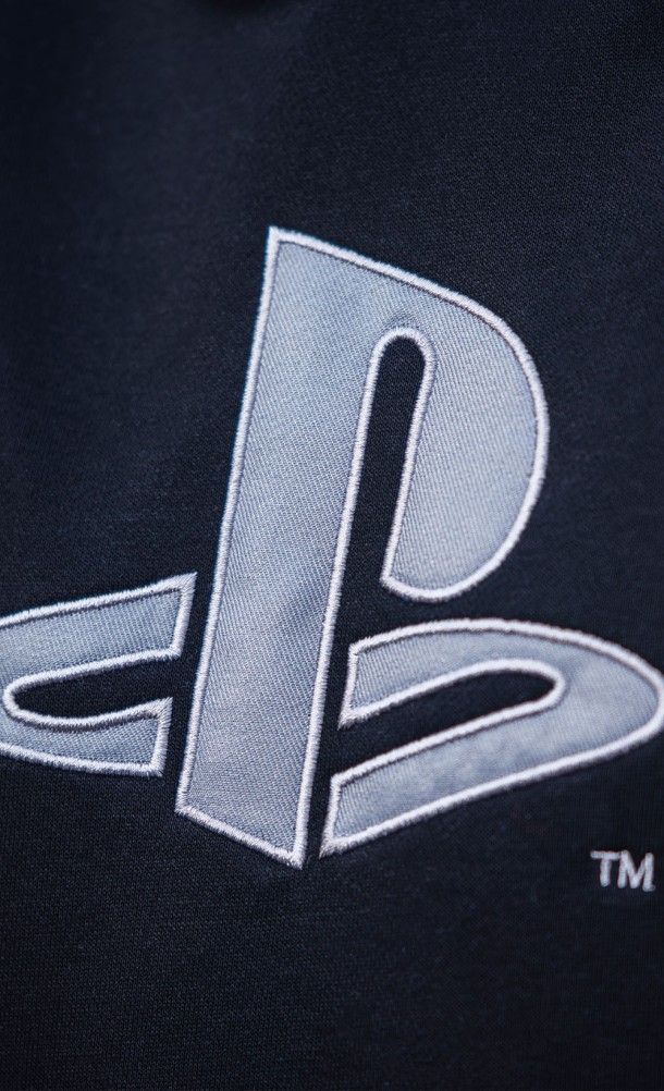 Close up detail on the front print of the DualSense hoodie from our PlayStation collection
