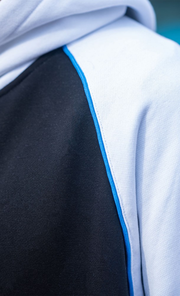 Close up detail on the trim of the DualSense hoodie from our PlayStation collection