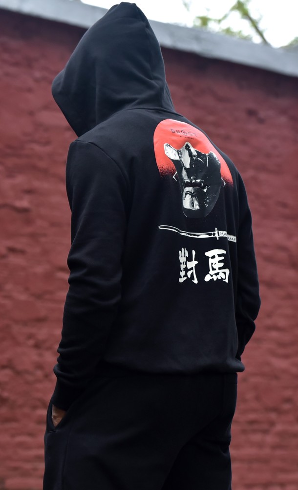 Model wearing the GHOST hoodie from our Ghost of Tsushima collection