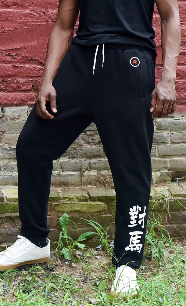 Model wearing the Jin Jogging Bottoms from our Ghost of Tsushima collection