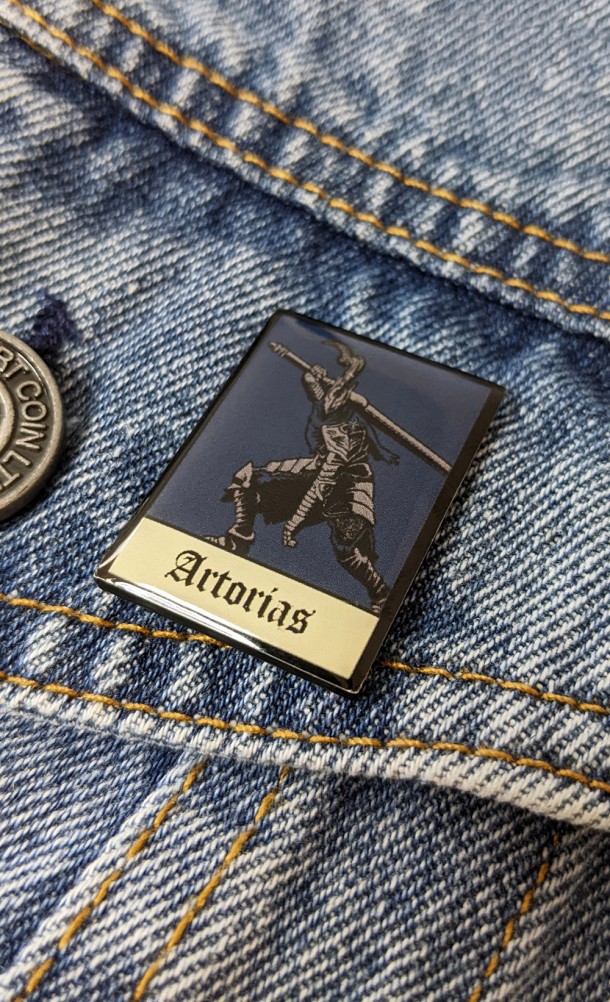 Image of the Artorias Enamel pin from our Dark Souls collection