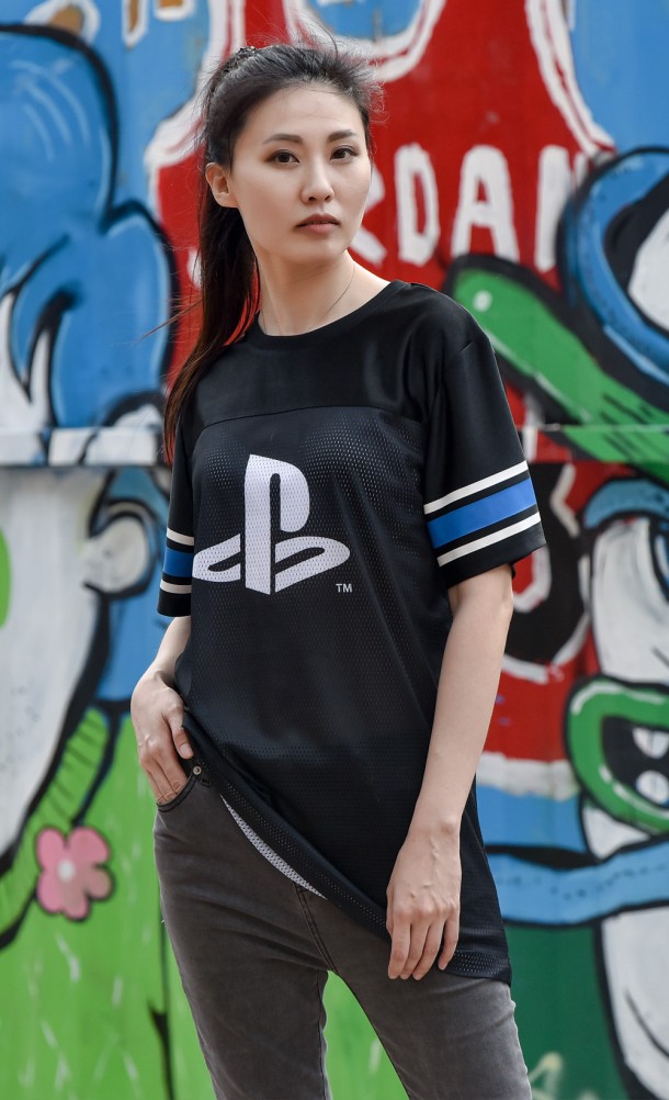 Model wearing the PS94 Football Jersey from our PlayStation collection