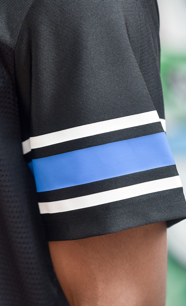 Close up detail on the sleeve trim of the PS94 Football Jersey from our PlayStation collection