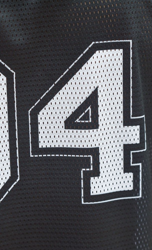 Close up detail on the back print of the PS94 Football Jersey from our PlayStation collection