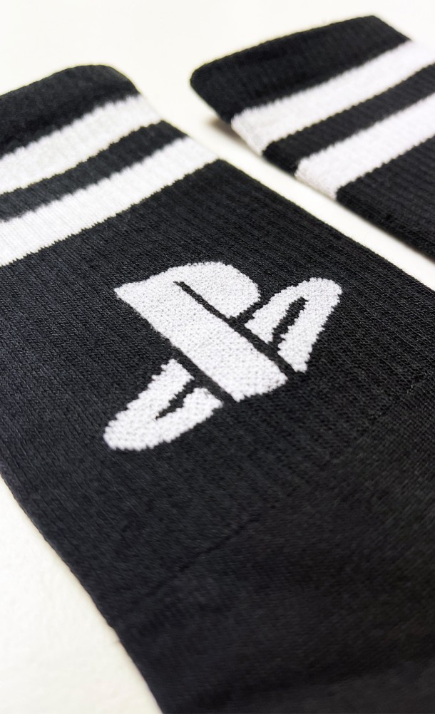 Close up detail on the print of the PlayStation Socks in Black from our PlayStation collection