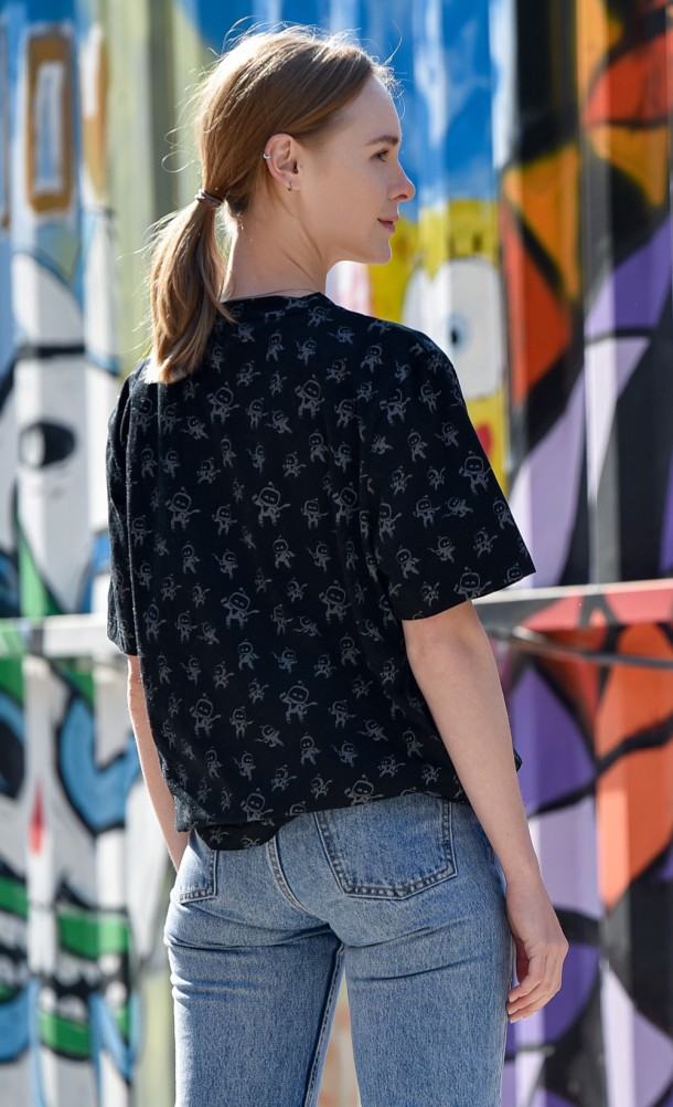 Model wearing the Astro Pattern T-shirt from our Astro's playroom collection