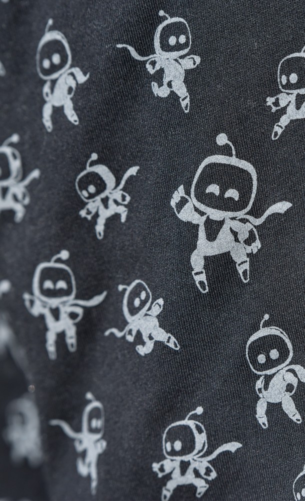 Close up detail of print on the Astro pattern T-shirt from our Astro's playroom collection