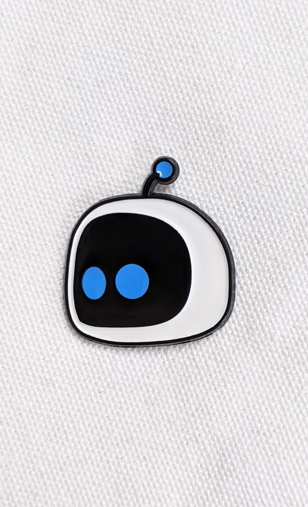 Image of the Astro Enamel pin from our Astro's playroom collection