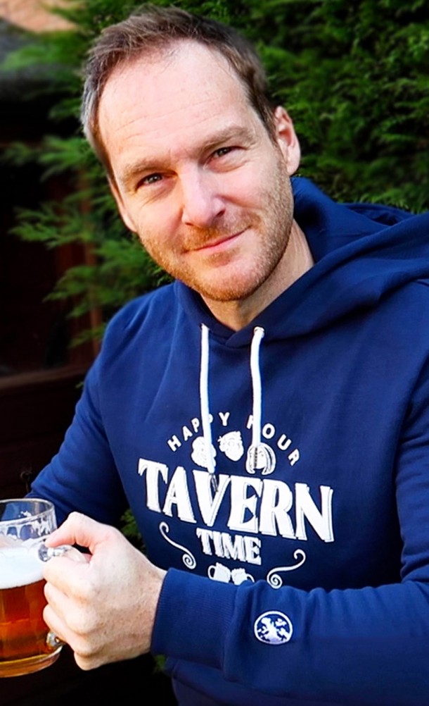 Model wearing the Tavern Time hoodie from our Eurogamer collection