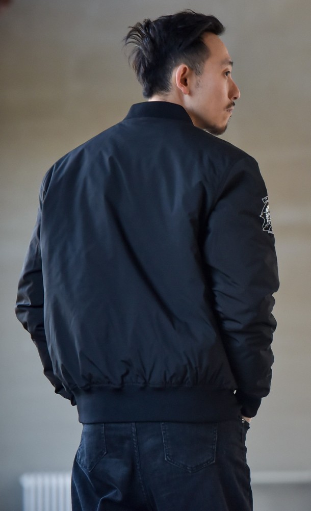 Model wearing the Hideo Kojima Bomber jacket from our Kojima Productions collection