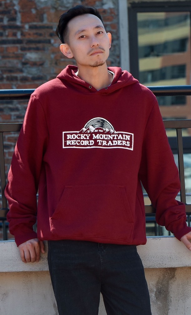 Model wearing the Rocky Mountain Record Traders hoodie from our Life is Strange collection