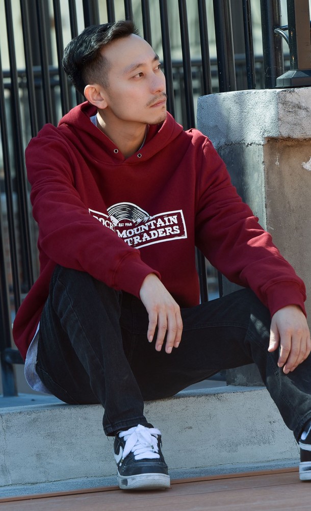 Model wearing the Rocky Mountain Record Traders hoodie from our Life is Strange collection