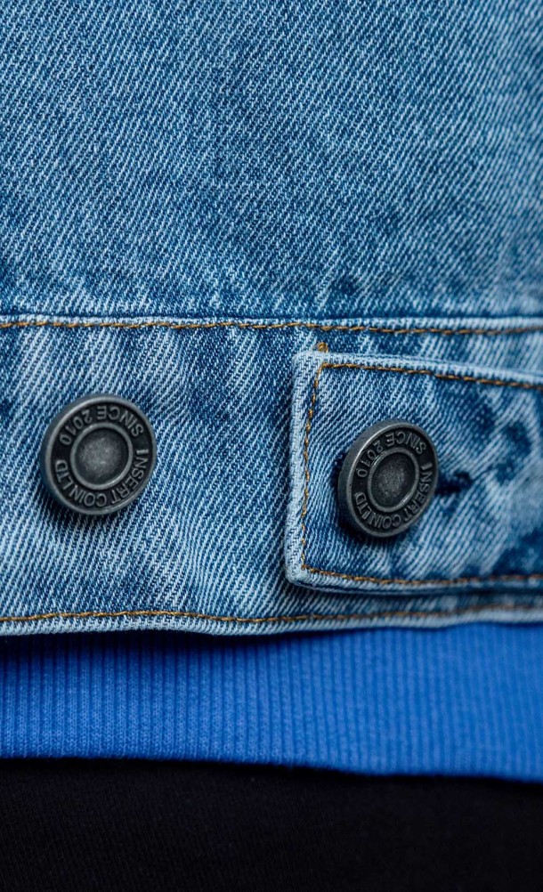 Close up detail on the buttons from the Alex Denim jacket from our Life is Strange collection