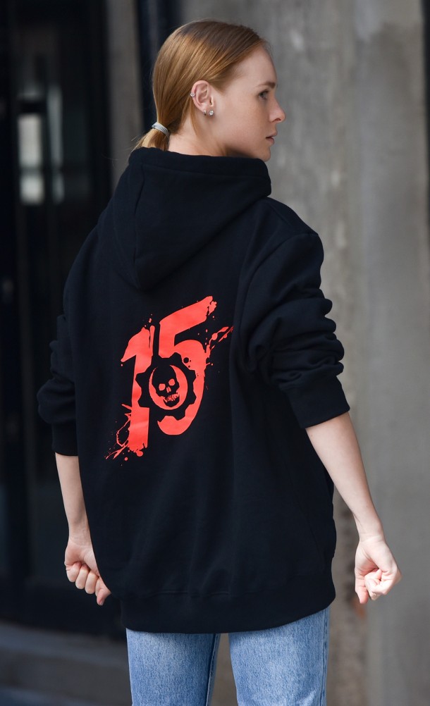 Model wearing the Gears Anniversary hoodie from our Gears of War collection