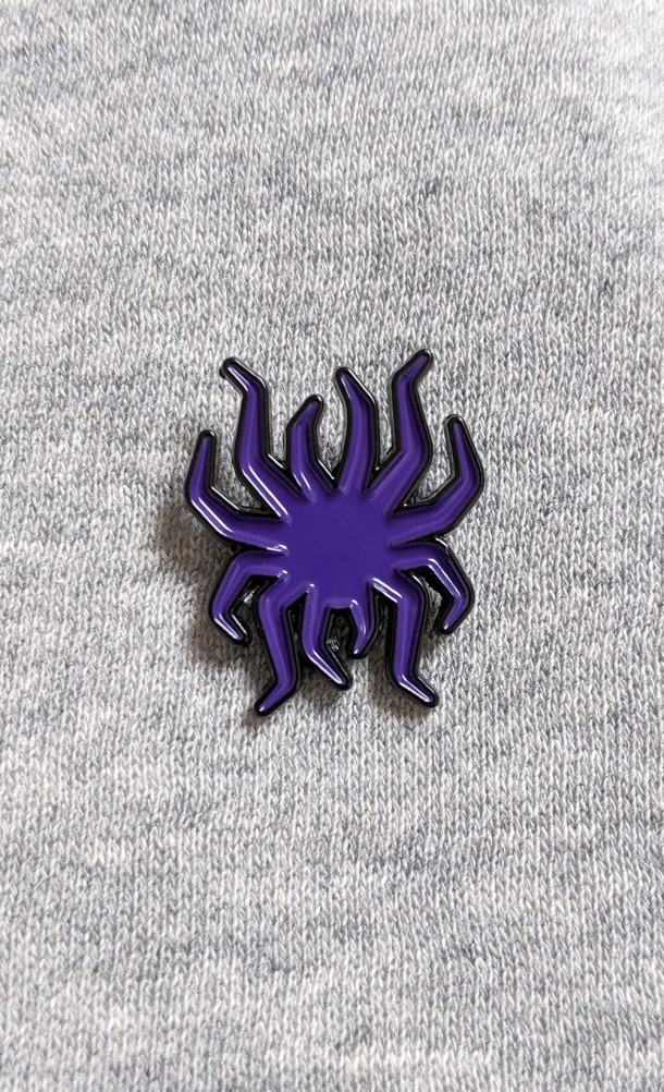 Image of the Parasite Enamel pin from our Returnal collection