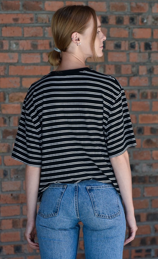 Model wearing the KP Stripe T-Shirt from our Kojima Productions collection
