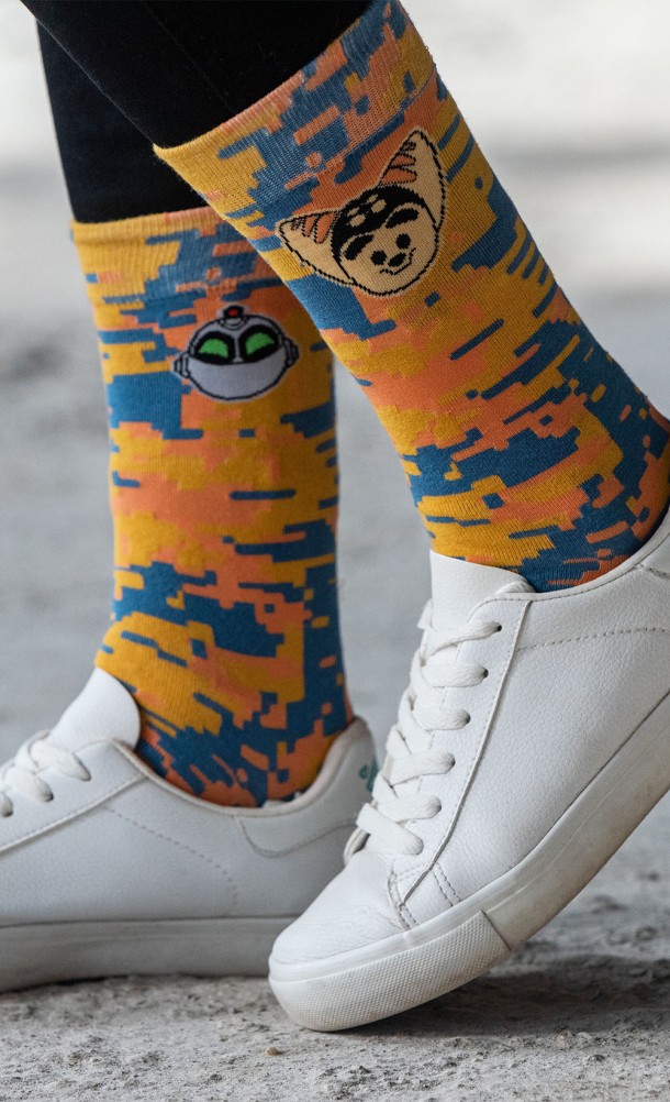 Model wearing the Ratchet & Clank Pixel socks from our Ratchet & Clank collection