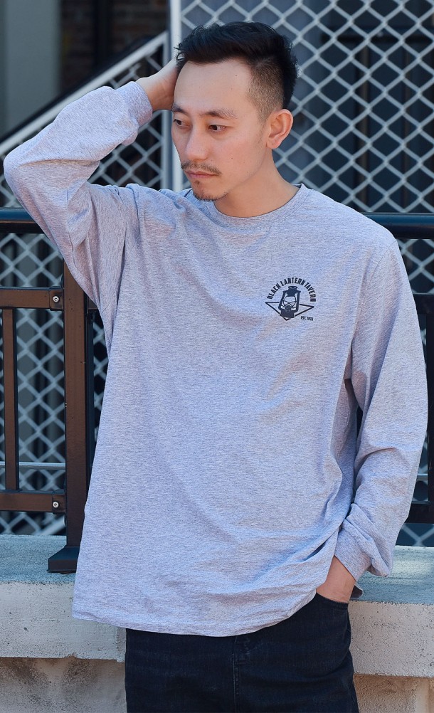 Model wearing the Black lantern tavern Long sleeve T-Shirt from our Life is Strange collection