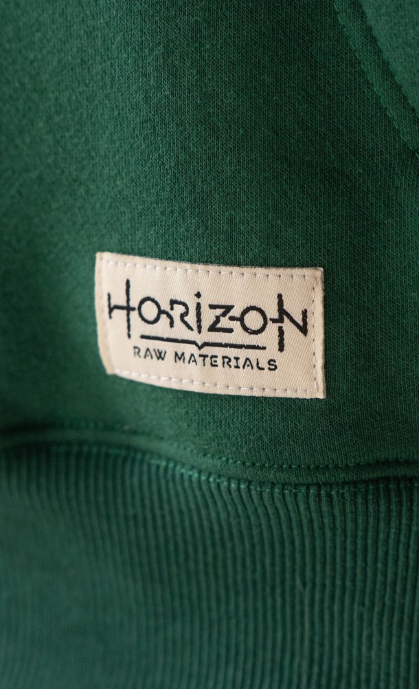 Close up detail on the front patch of the Tide's Reach hoodie from our Horizon Forbidden West collection