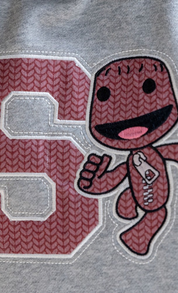 Close up detail on the front print of the Sackboy Hoodie from our Sackboy collection