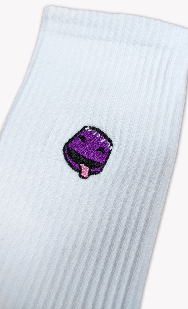 Close up detail on the print of the Sackboy's feels Socks in White from our Sackboy collection