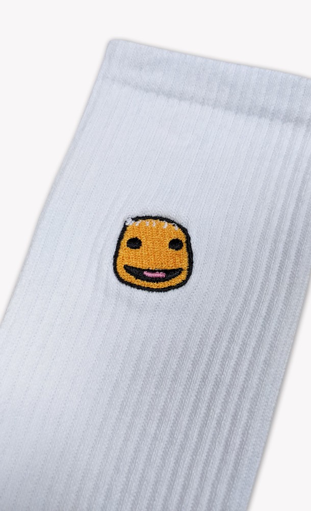 Close up detail on the print of the Sackboy's feels Socks in White from our Sackboy collection