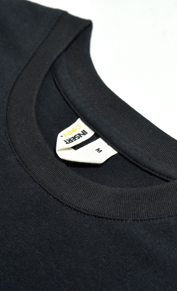 Close up detail on the hang tag of the WASD T-Shirt from our WASD collection