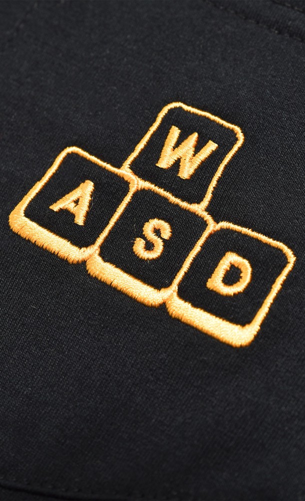 Close up detail on the pocket print of the WASD Pocket T-Shirt from our WASD collection