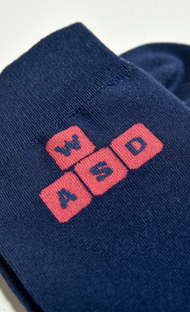 Close up detail on the print of the WASD socks from our WASD collection