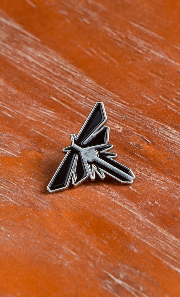 Image of the Fireflies enamel pin from our The Last of Us collection