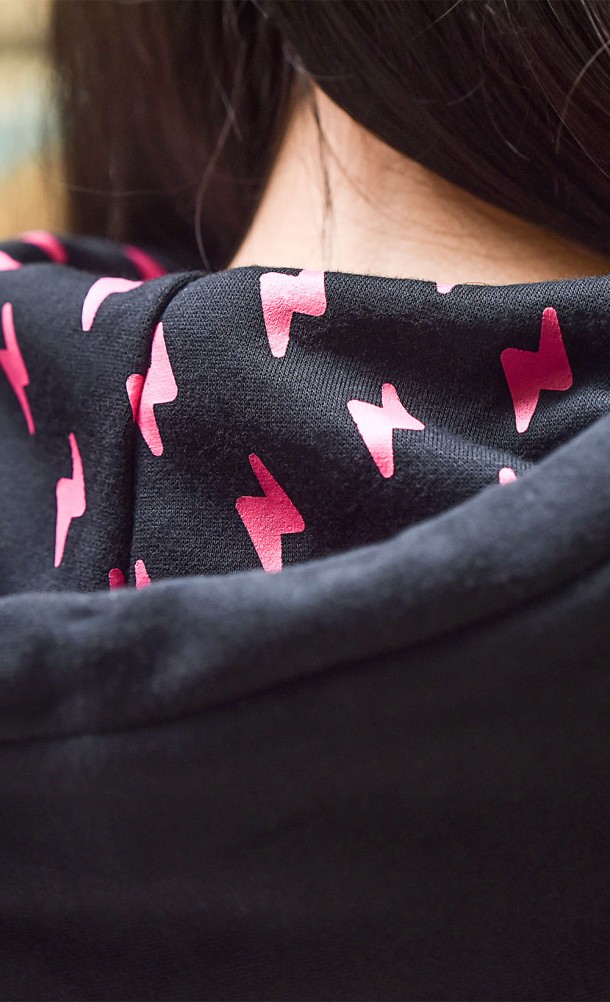 Close up detail on the hood of the Falling Bean hoodie from our Fall Guys collection
