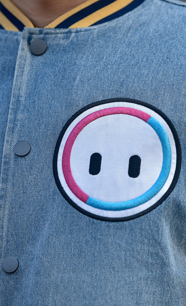 Close up detail on the front print of the Retro Bean varsity jacket from our Fall Guys collection