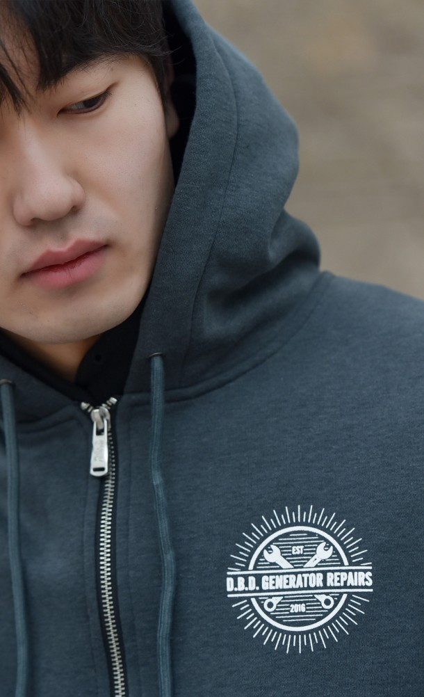 Model wearing the Generator Repairs hoodie from our Dead by Daylight collection