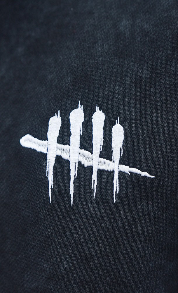 Close up detail of the chest print on the Dbd Acid Hoodie from our Dead by Daylight collection