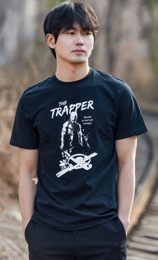 Model wearing The Trapper T-Shirt from our Dead by Daylight collection