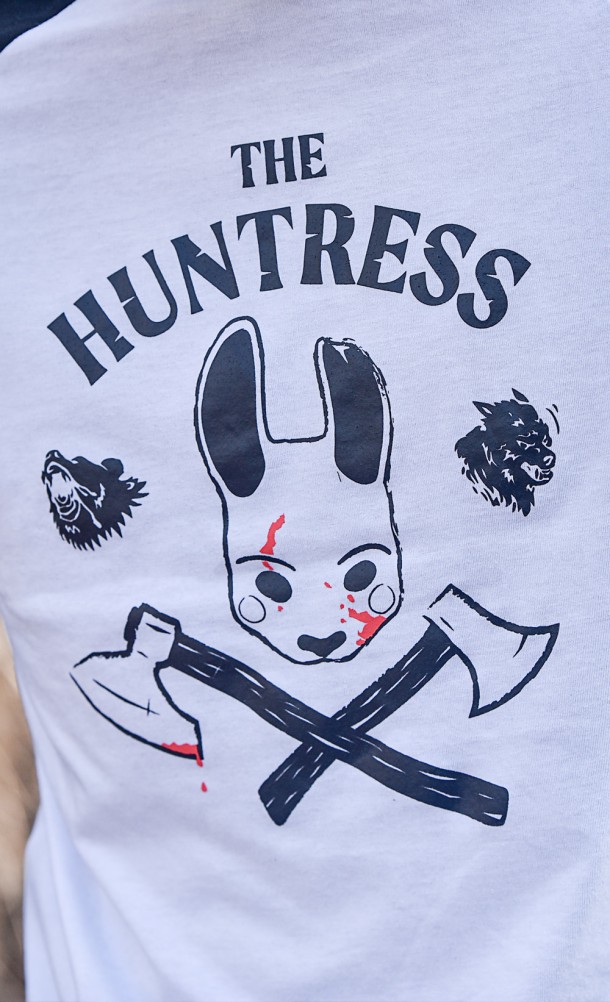 Close up on detail of the print on The Huntress Raglan T-shirt from our Dead by Daylight collection